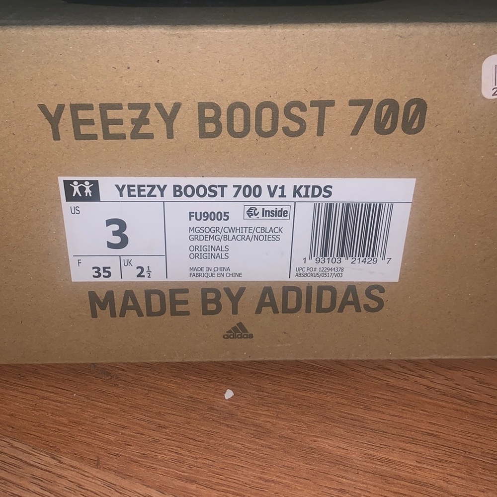 Yeezys boost. Has a stain in one sneaker overall in good condition.